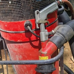 Red Wheeled Industrial Canister Vacuum Unit with Hose Attachment Included
