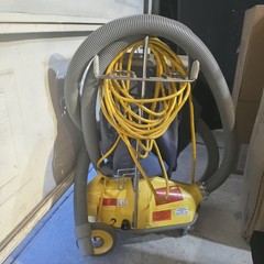 NSS Model M-1 “Pig” commercial heavy-duty canister vacuum cleaner