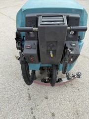 TENNANT 5700 XP SCRUBBER.On a pallet ready for pick up or shipping paid by buyer