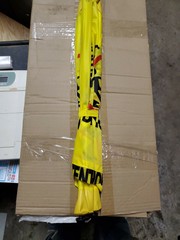 Four Facet caution sign Smart design 20 + inches high. Minimal storage space