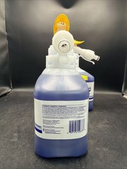 2 Bottles Diversey Glance HC 1.5L Glass/Multi-Surface Cleaner ( SKU 93063402 ).