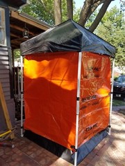 Portable shower Andax de con pac decontamination shower orange and black 