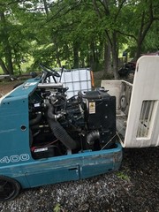 Tennant 6400 “LP Gas ” Ride On Parking lot Sweeper .