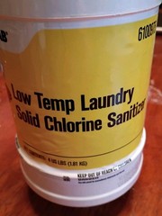Ecolab 6100975 Low Temp Laundry Solid Chlorine Sanitizer 4lb