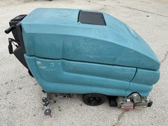 TENNANT 5700 XP SCRUBBER.On a pallet ready for pick up or shipping paid by buyer