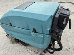 TENNANT 5700 XP SCRUBBER.On a pallet ready for pick up or shipping paid by buyer