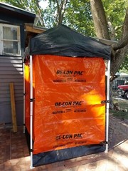 Portable shower Andax de con pac decontamination shower orange and black 