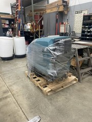 TENNANT 5700 XP SCRUBBER.On a pallet ready for pick up or shipping paid by buyer